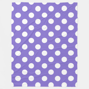 White polka dots on periwinkle fleece blanket