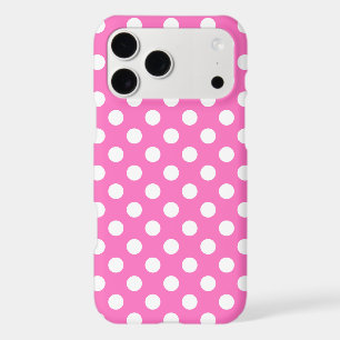 White polka dots on pink