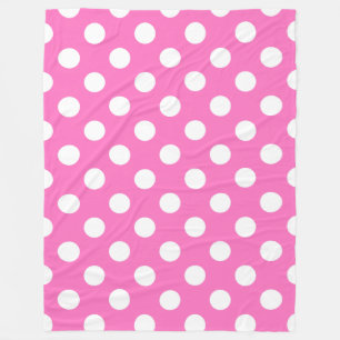 White polka dots on pink fleece blanket