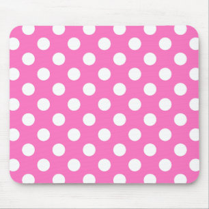 White polka dots on pink mouse mat