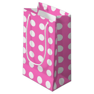 White polka dots on pink small gift bag