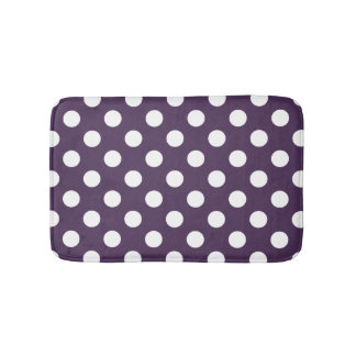 White polka dots on plum purple bath mat