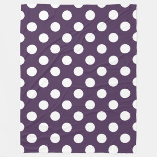 White polka dots on plum purple fleece blanket