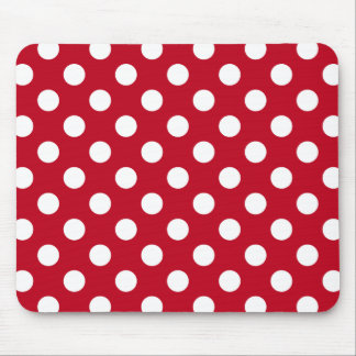 White polka dots on red mouse mat