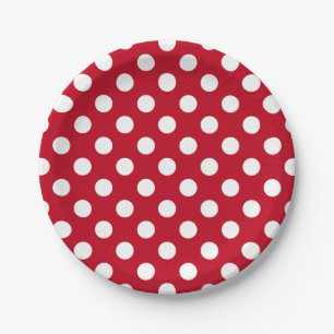 White polka dots on red paper plate