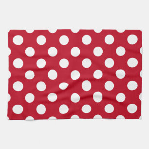 White polka dots on red tea towel