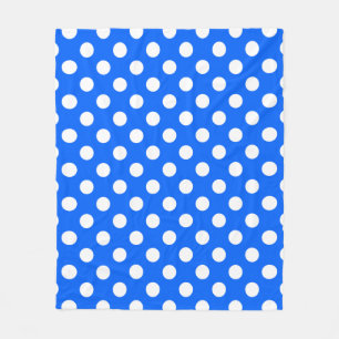 White polka dots on royal blue fleece blanket
