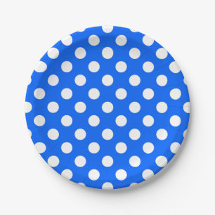 White polka dots on royal blue paper plate