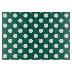White polka dots on sage green cutting board