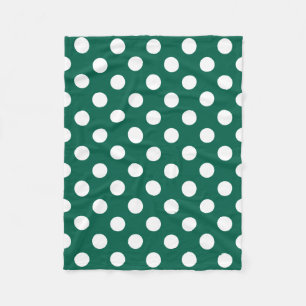 White polka dots on sage green fleece blanket