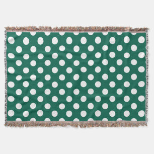 White polka dots on sage green throw blanket