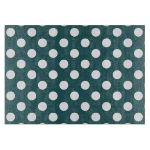 White polka dots on teal cutting board