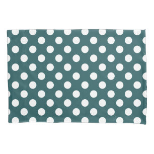 White polka dots on teal pillowcase