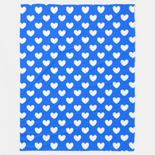 White polka hearts on blue fleece blanket