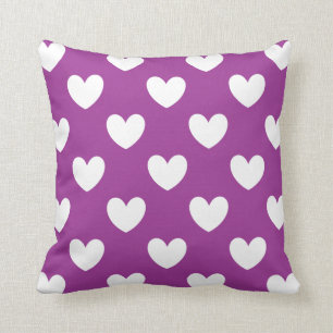 White polka hearts on purple cushion