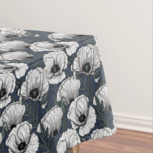 White poppies on navy tablecloth