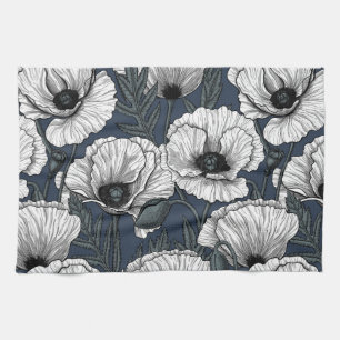 White poppies on navy tea towel