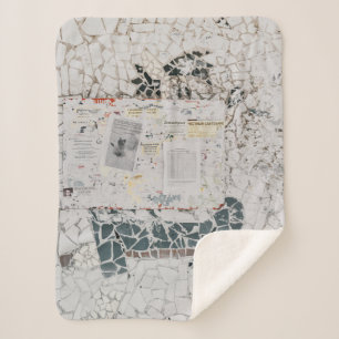 White printer paper on white and grey concrete wal sherpa blanket