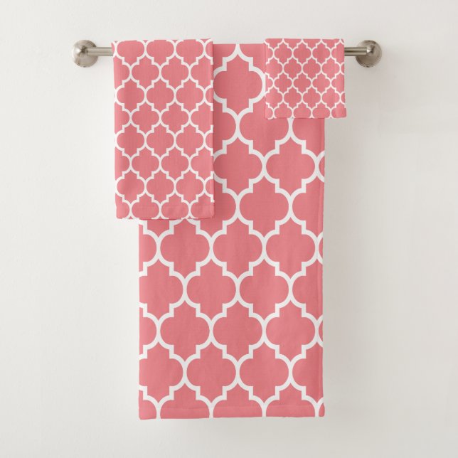 White quatrefoil pattern on pink bath towel set (Insitu)