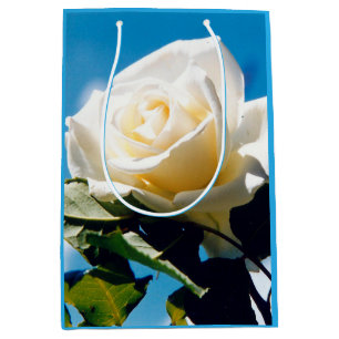 White rose under blue sky medium gift bag