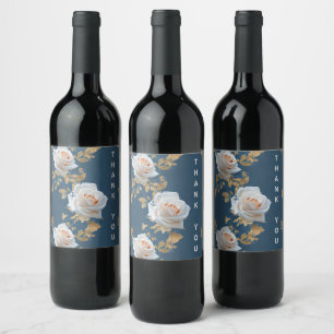 White roses and gold leaves on a blue background wine label