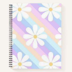 white roses with a colourful background notebook