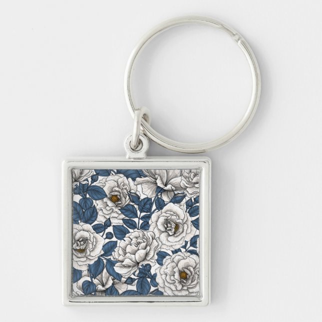 White roses with blue leaves on white key ring (Front)
