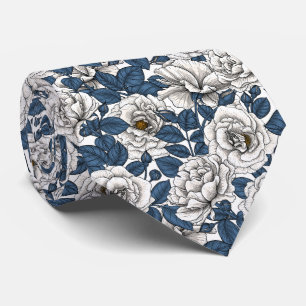 White roses with blue leaves on white tie