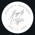 White Round Happily Ever After Calligraphy Wedding Classic Round Sticker<br><div class="desc">This envelope seal sticker features "Happily Ever After" in an elegant calligraphy script font in the centre with your names and wedding date in a round serif typography in black placed on a white background. Perfect for couples who love minimalist and simple designs! This product is part of our "Happily...</div>