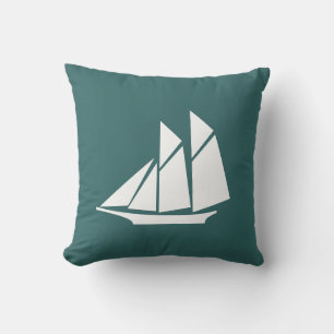 white sailboat  on dark grey  blue pillow