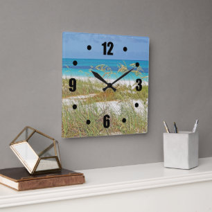 "WHITE SAND BEACH, SEA GRASS, BLUE-GREEN WATER" SQUARE WALL CLOCK