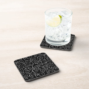 White Scrolling Curves on Black Coaster