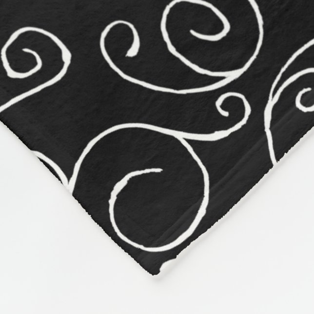 White Scrolling Curves on Black Fleece Blanket (Corner)