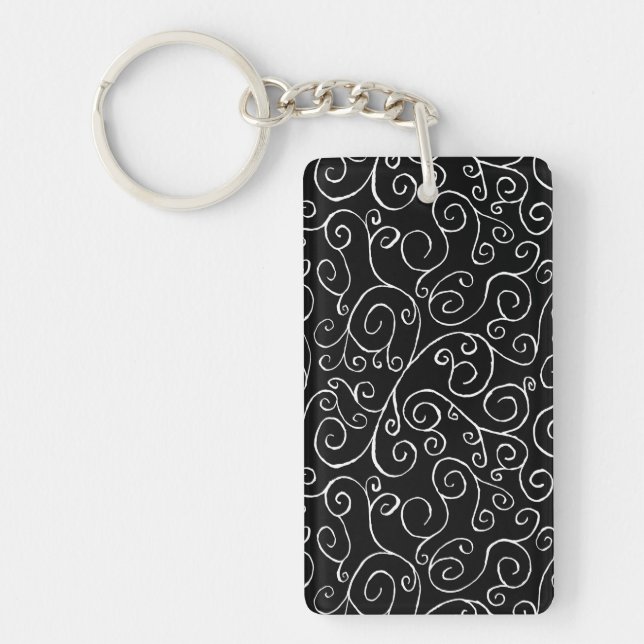 White Scrolling Curves on Black Key Ring (Front)