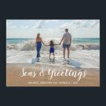 White Seas and Greetings  Beach Christmas Holiday Card<br><div class="desc">A clever take on the traditional holiday card features your favourite beach photo with Seas & Greetings in a modern white script . Personalise with your family name and the year.</div>