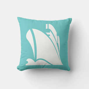 white ship  on teal blue pillow