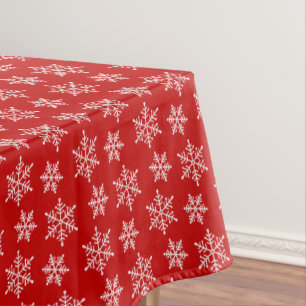 White Snowflake Pattern on Red Tablecloth