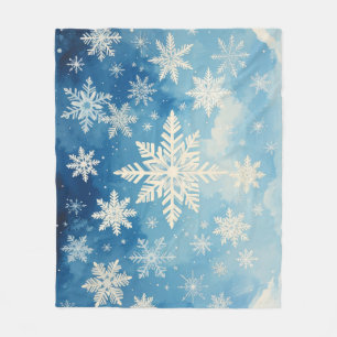 White snowflakes falling on a blue watercolor sky fleece blanket