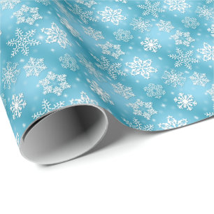 white snowflakes on aqua wrapping paper