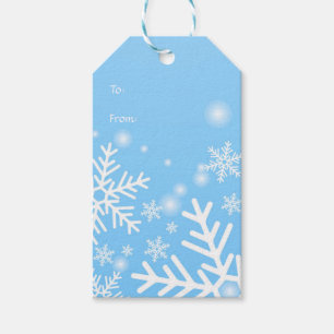 White snowflakes on blue Christmas Gift Tags
