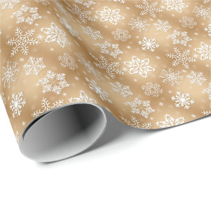 white snowflakes on gold wrapping paper