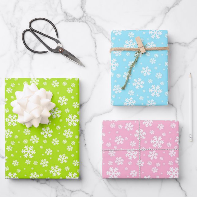 White Snowflakes on Green, Blue & Pink Wrapping Paper Sheet (Front)