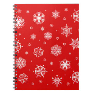 White snowflakes on red background notebook