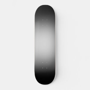 White spotlight on black skateboard