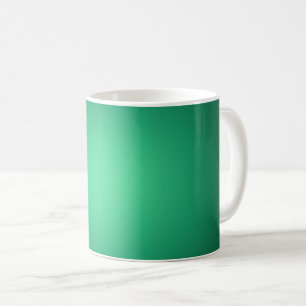 White spotlight on green coffee mug