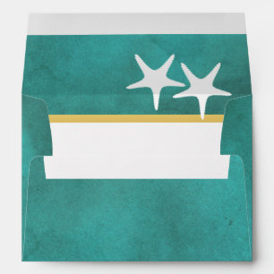 White starfish on teal stained paper beach wedding envelopes