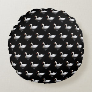 White swan on black round cushion