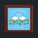 White Swans and Water lilies Wedding Custom Gift Box<br><div class="desc">This awesome Wedding gift box features a digital art image of a pair of beautiful white swans with orange becks facing each other looking like they are kissing. Underneath the swans is a group of pretty pink water lily flowers with yellow centres and green lily pads. A beautiful wedding design....</div>