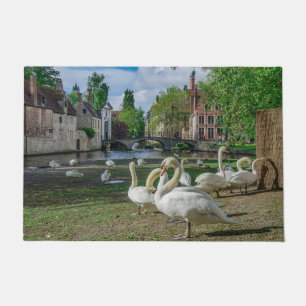 White swans in Bruges Doormat