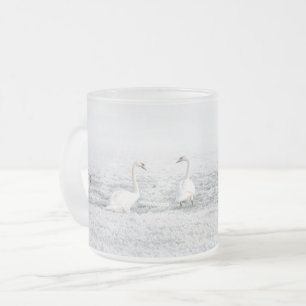 White swans in winter snow frosted glass coffee mug